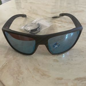 Never worn new Oakley sunglasses